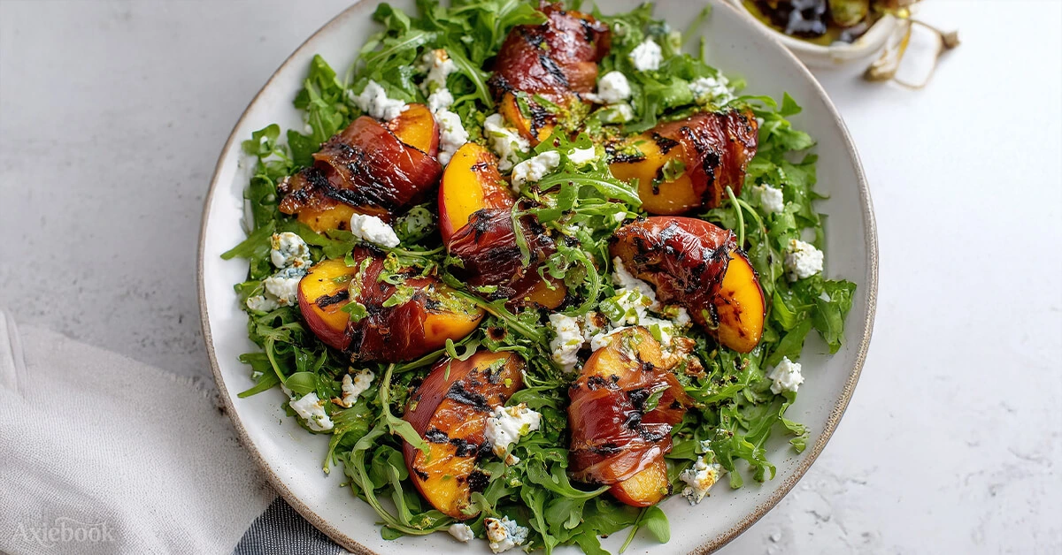 Grilled Prosciutto Wrapped Peaches with Arugula and Goat Cheese