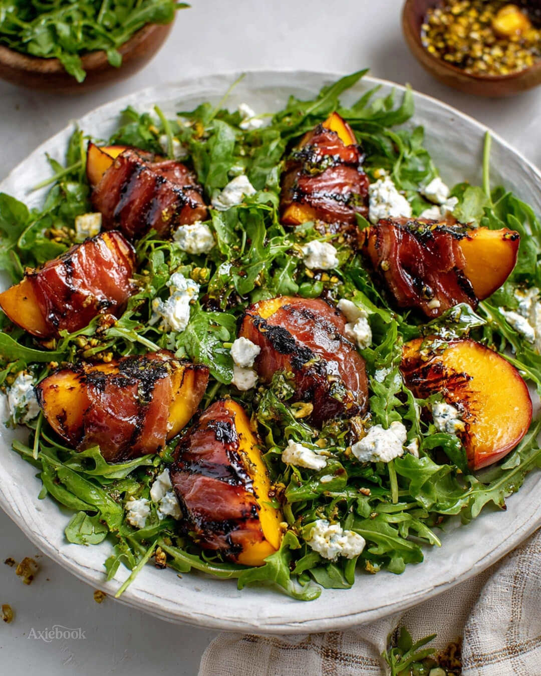 How to Make Grilled Prosciutto Wrapped Peaches with Arugula Goat Cheese