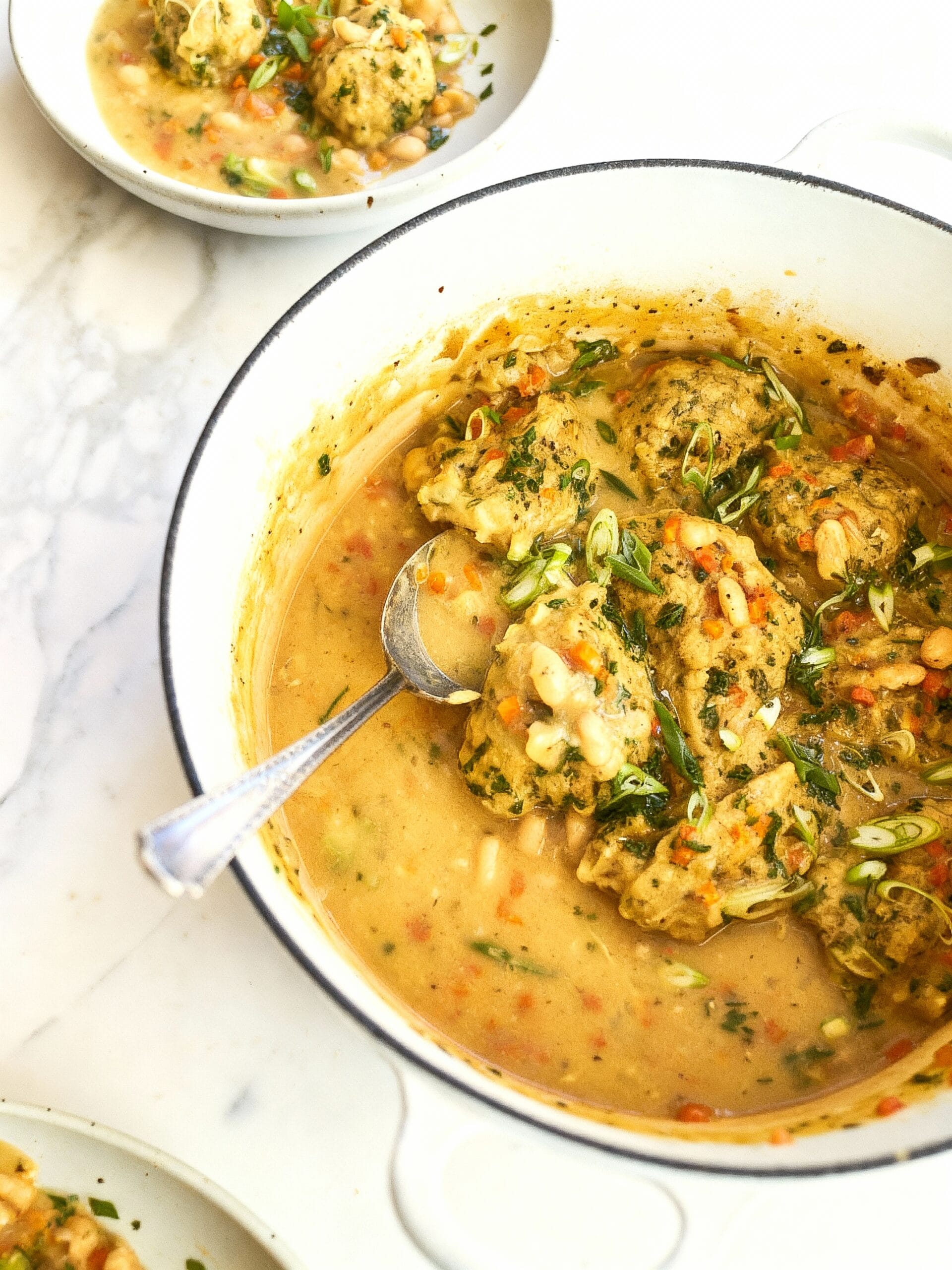 What Makes This White Bean Soup with Pesto Herb Dumplings a Keeper